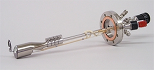&ldquo;Effusion cell with a tilted crucible including shutter&rdquo;